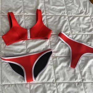 Never worn red zip up Hoka Swimsuit